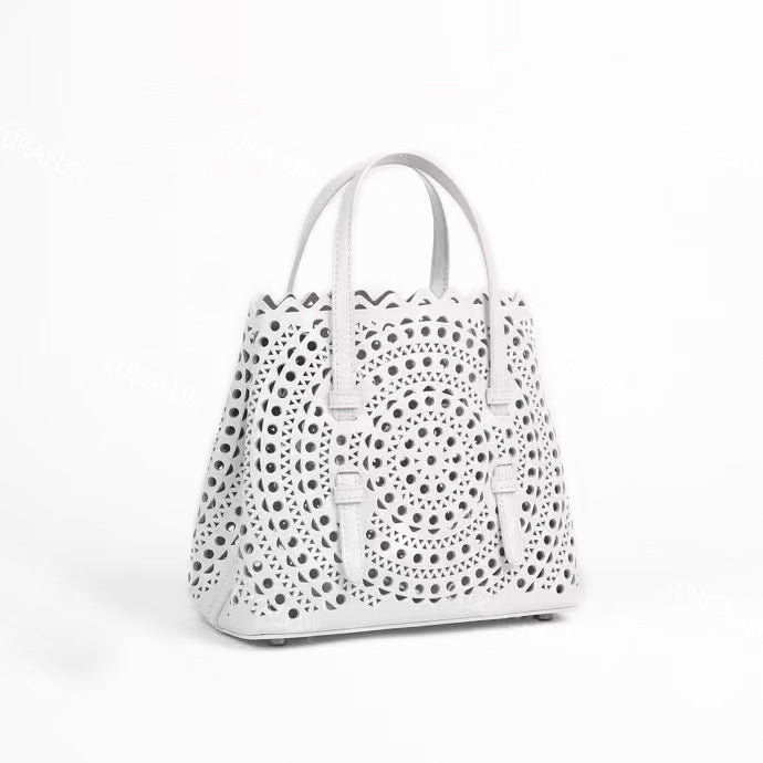 Women's Grain Cowhide Hollow Summer Laser Design Handbags