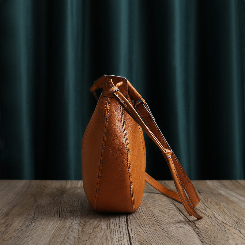 Women's Vegetable Tanned Cowhide Leather Simple Dumpling Shoulder Bags
