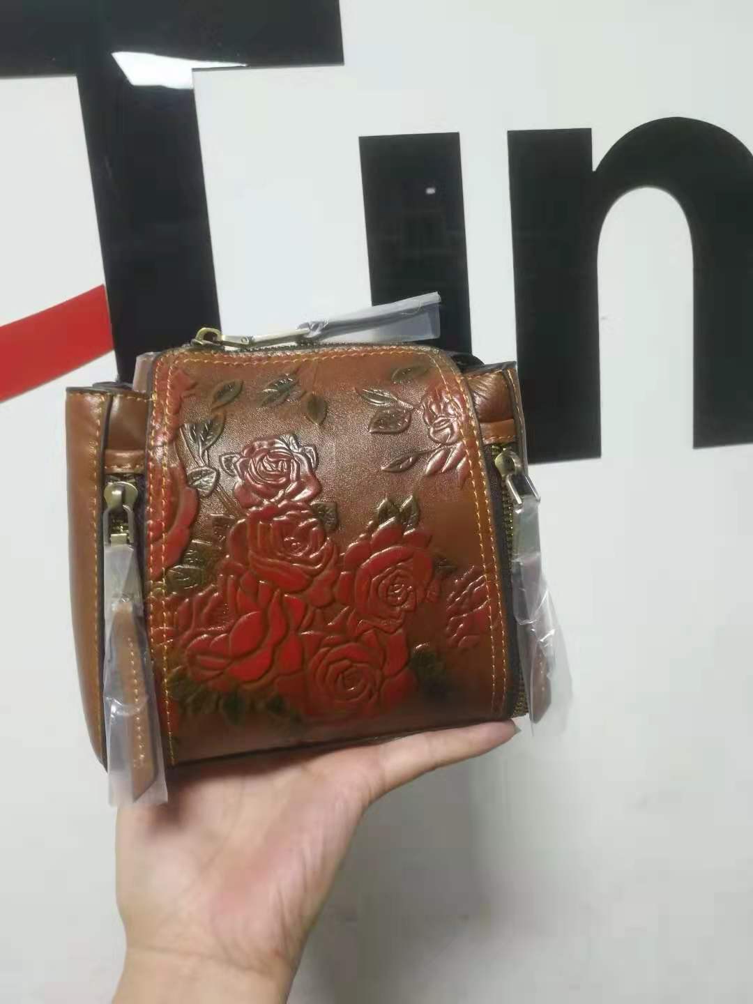 Women's Fashionable Genuine Leather Retro Hand Embossed Portable Handbags