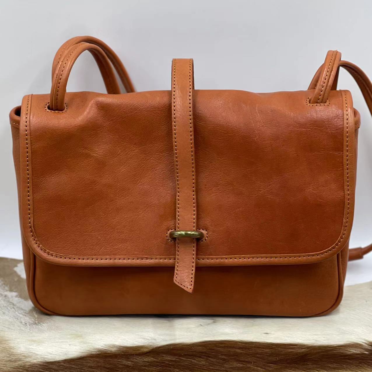 Women's Layer Vegetable Tanning Leather Niche Retro Commuter Crossbody Bags