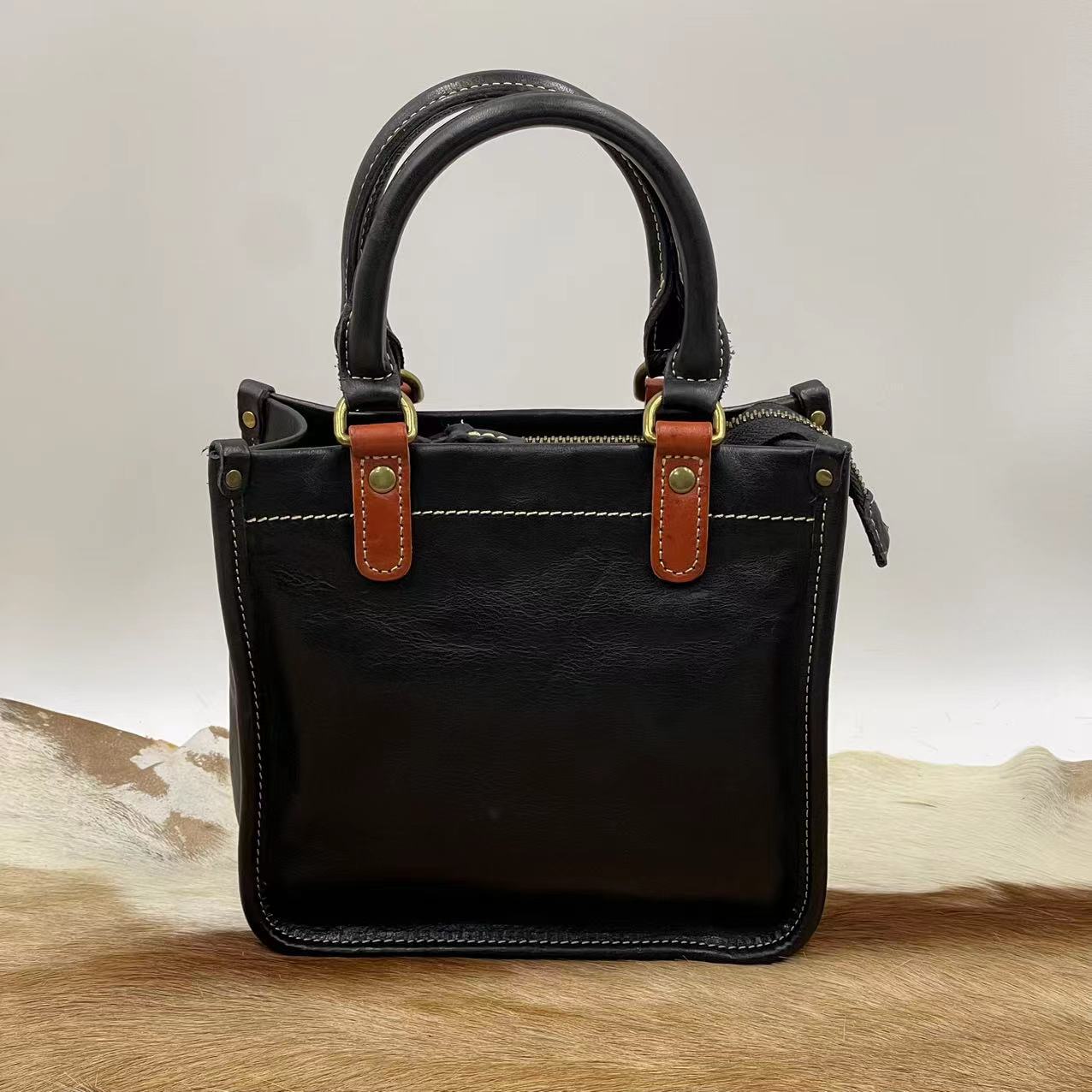 Women's Vegetable Tanning Leather Hand Holding Goddess Crossbody Bags
