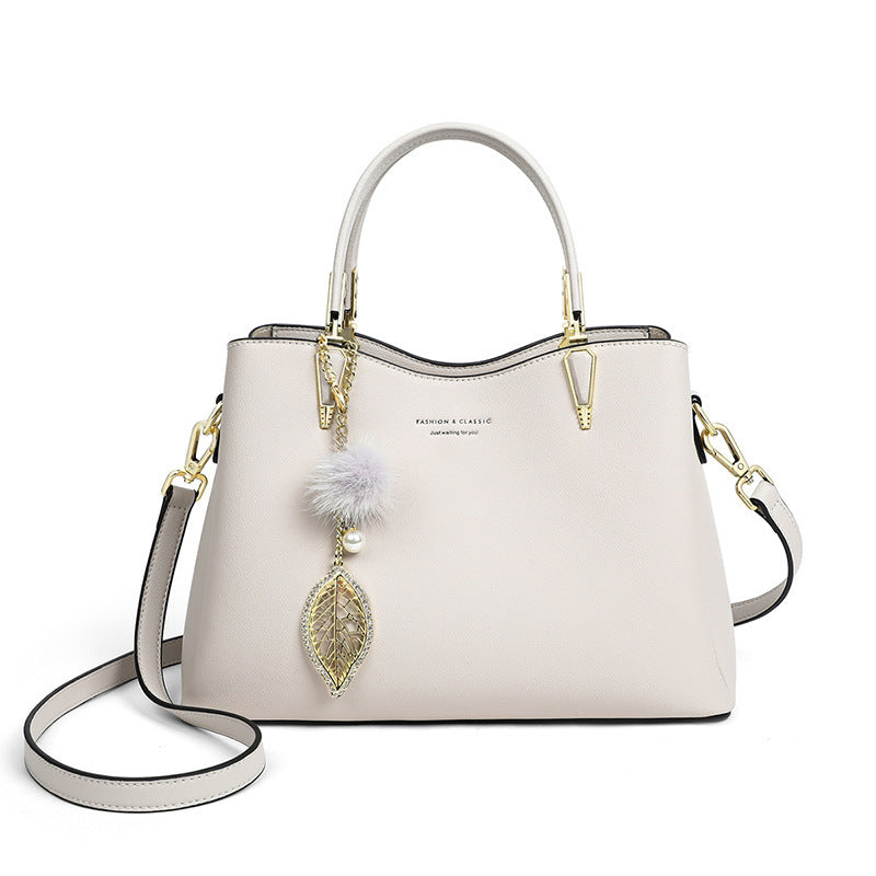 Women's Summer Cowhide Large Capacity Commuter Korean Handbags