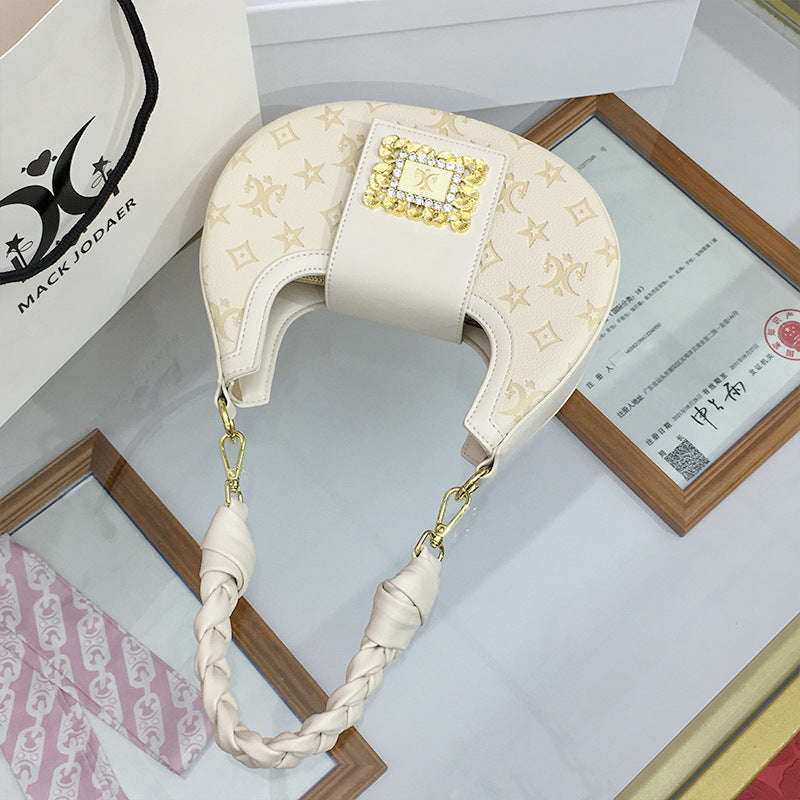 Women's French Minority Embossed Crescent Hand-woven Twist Armpit Bags