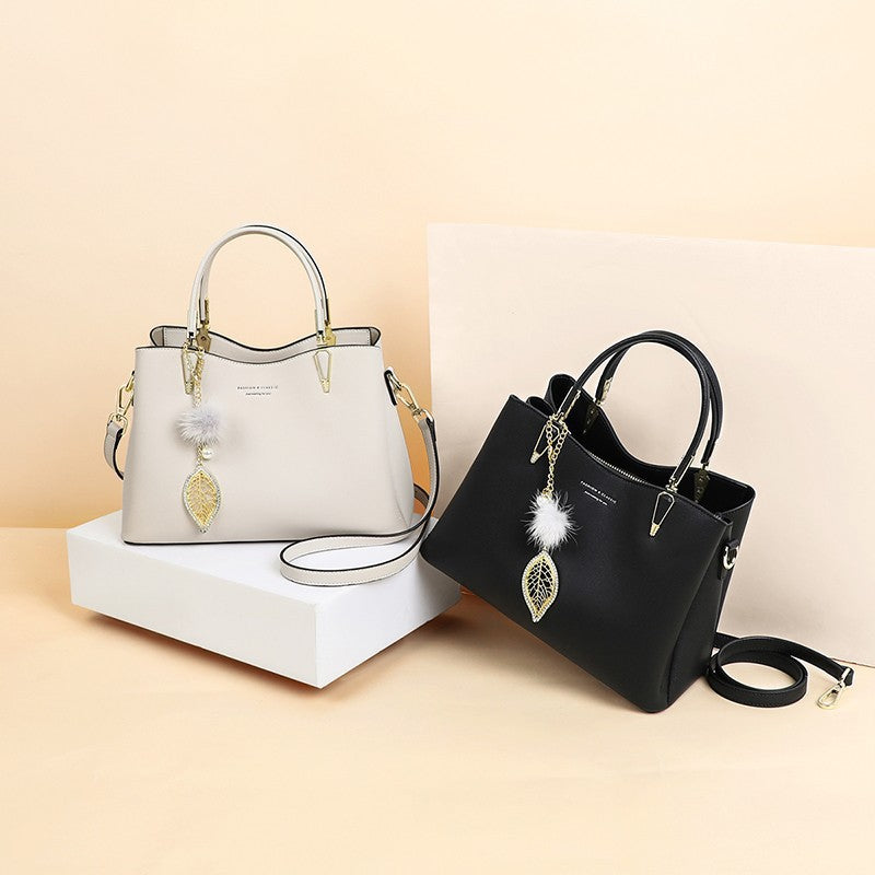 Women's Summer Cowhide Large Capacity Commuter Korean Handbags
