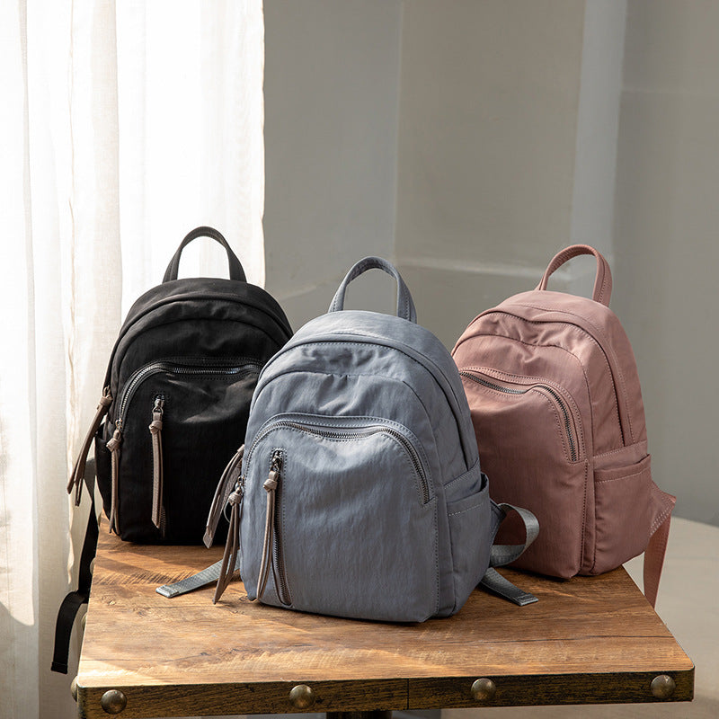 Women's Summer Street Fashion Oxford Cloth Tassel Backpacks