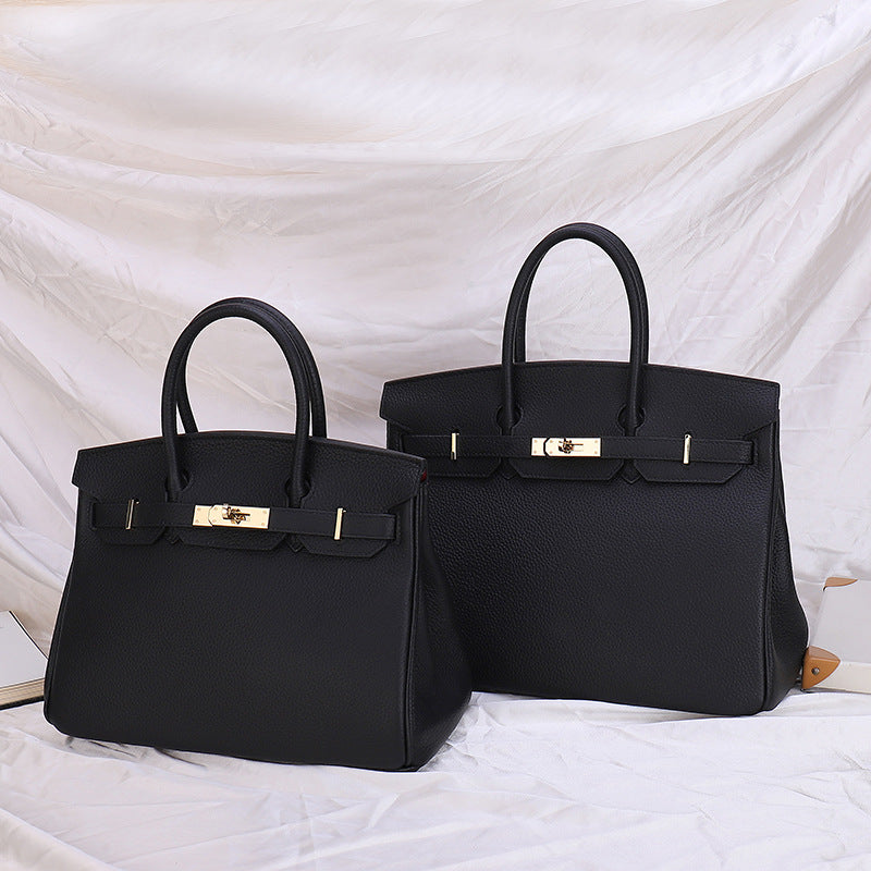 Women's Color Matching Spoof Fashion First Layer Cowhide Handbags