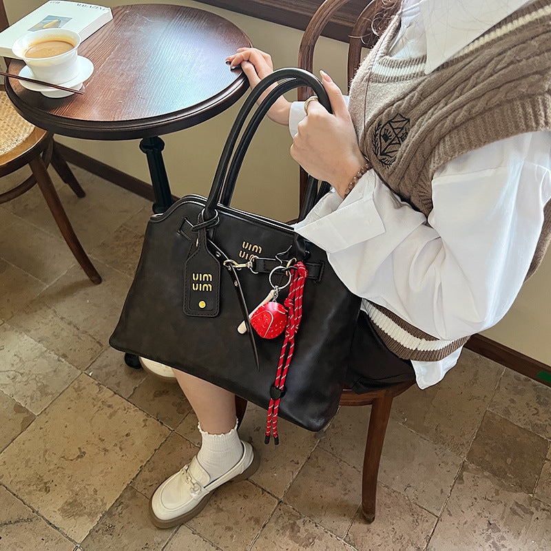 Women's Retro Hand-held Advanced Exquisite Commuter Bags