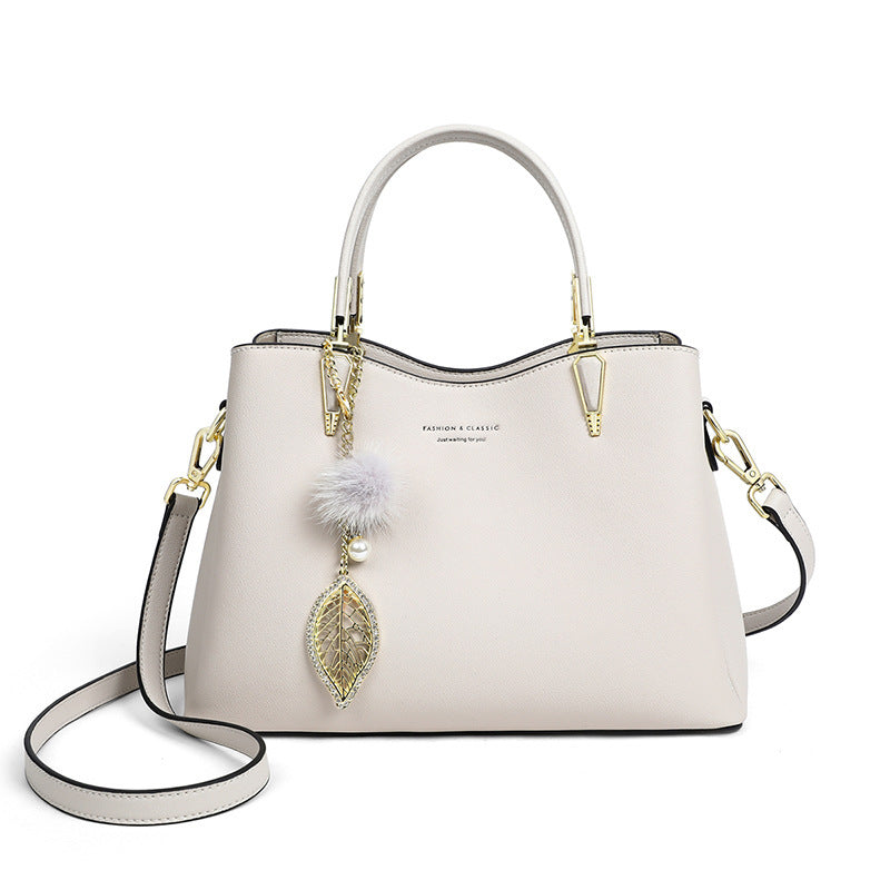 Women's Summer Cowhide Large Capacity Commuter Korean Handbags