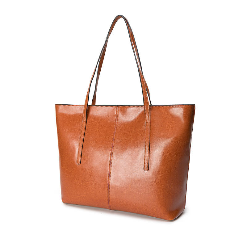 Women's Large Capacity Leather Fashion Cowhide Portable Tote Bags