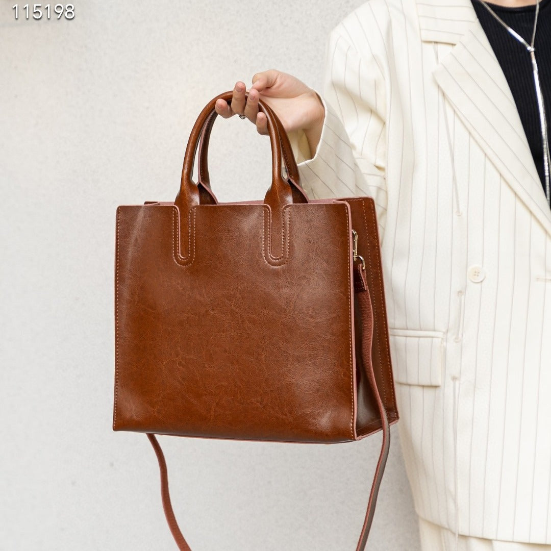 Women's Elegant Cowhide Lazy Design Commuter Large Capacity Shoulder Bags