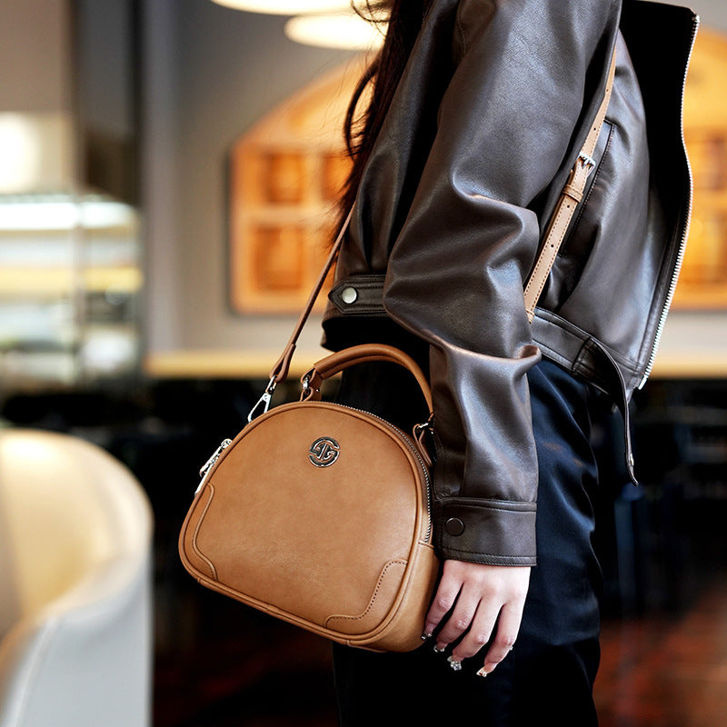 Women's Cow Leather Solid Color Round Fashion Crossbody Bags