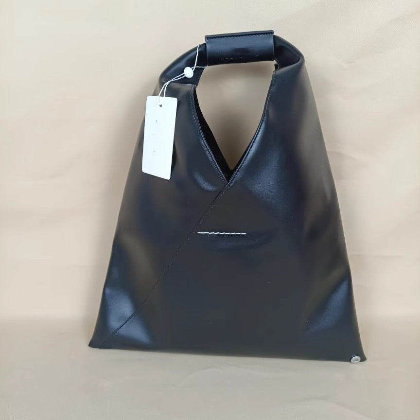 Women's Niche Cowhide Underarm Idle Style Garbage Bags