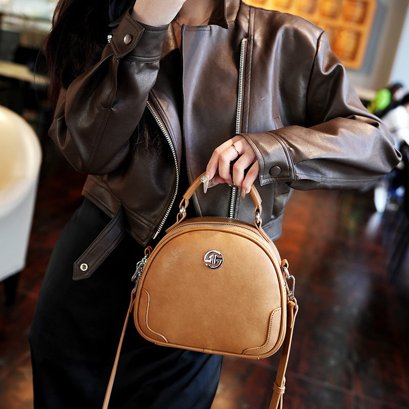 Women's Cow Leather Solid Color Round Fashion Crossbody Bags
