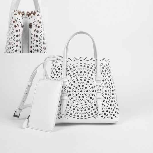 Women's Grain Cowhide Hollow Summer Laser Design Handbags