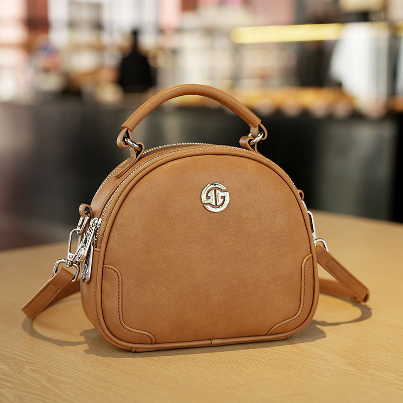 Women's Cow Leather Solid Color Round Fashion Crossbody Bags