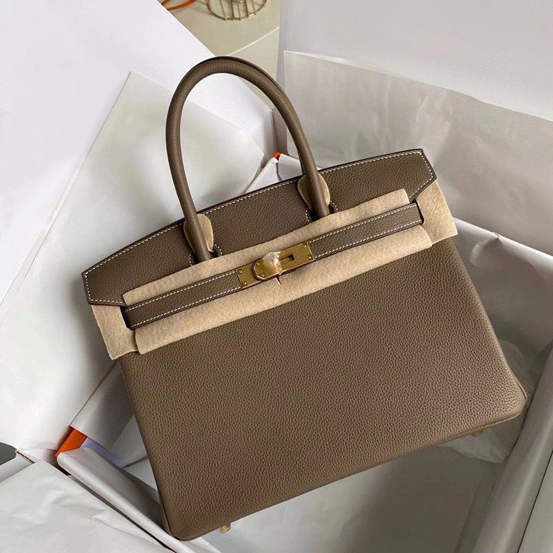 Women's Cowhide Genuine Leather Portable High-grade Simple Handbags