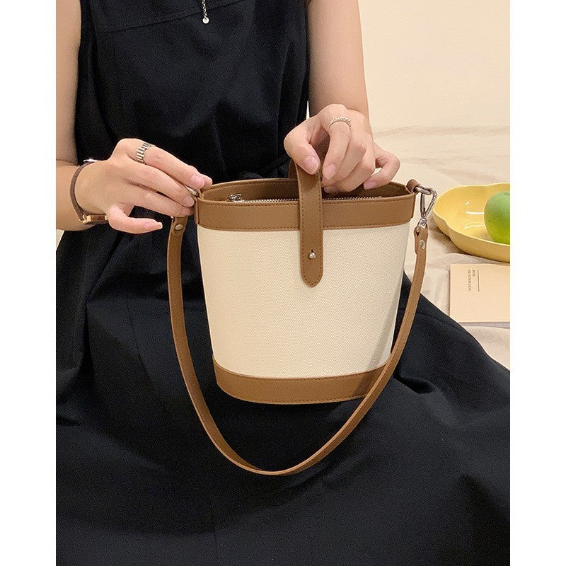 Women's Cowhide Leather Minority Fashion Contrast Color Bucket Bags