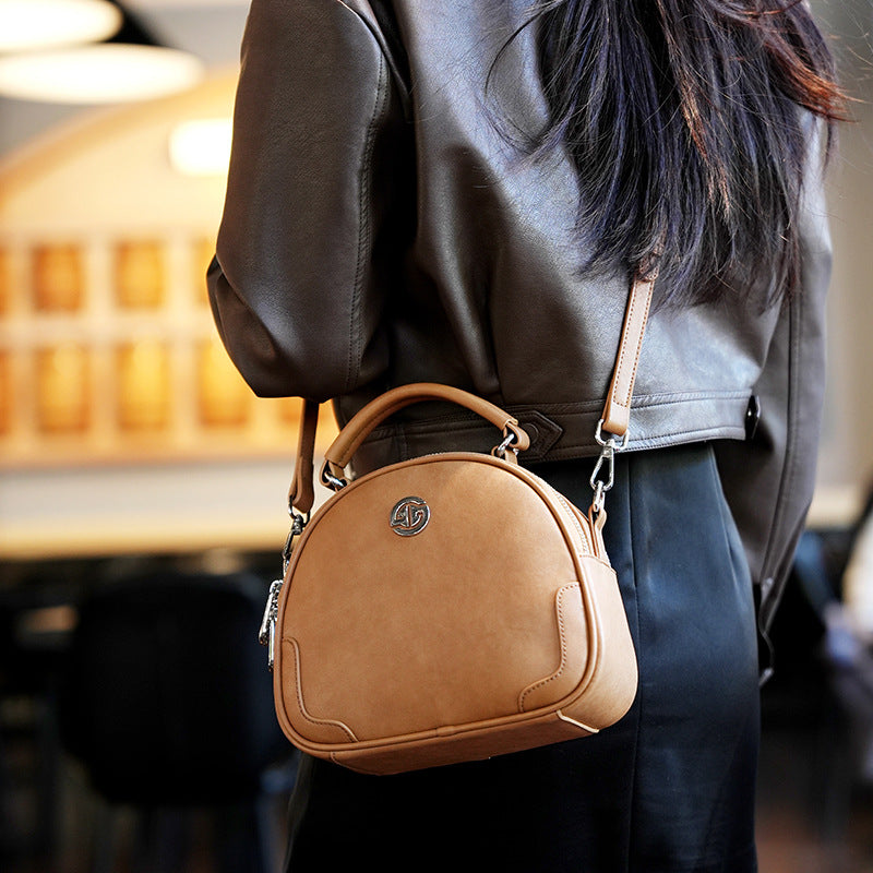 Women's Cow Leather Solid Color Round Fashion Crossbody Bags