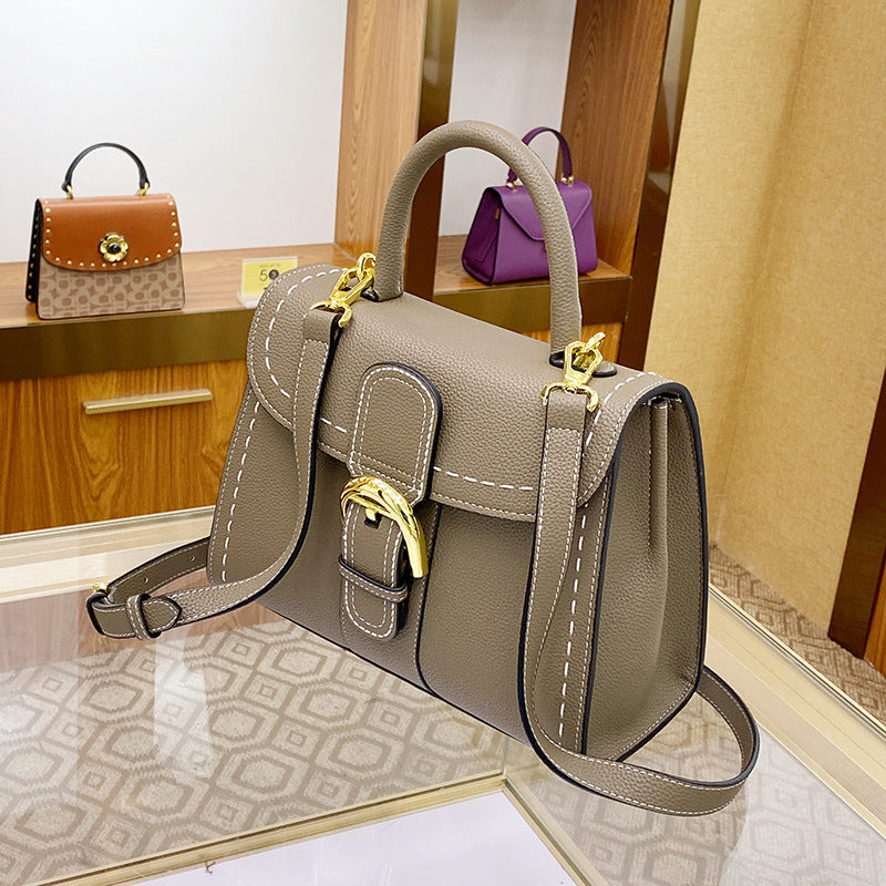 Women's Vachette Clasp Cowhide Leather Kelly Saddle Handbags