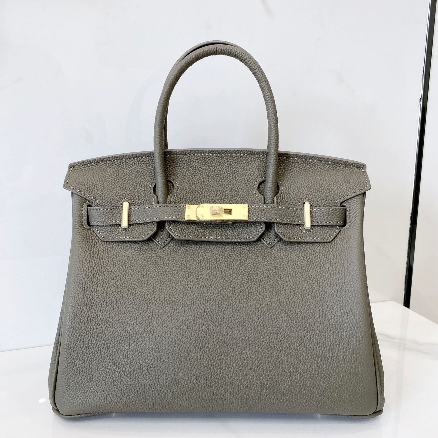 Women's First Layer Cowhide Lychee Pattern Gold Genuine Handbags