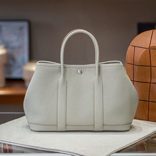 Women's Wax Line Leather Portable Large Capacity Handbags