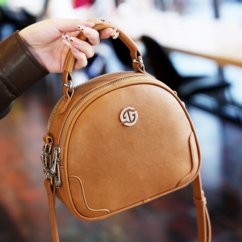 Women's Cow Leather Solid Color Round Fashion Crossbody Bags