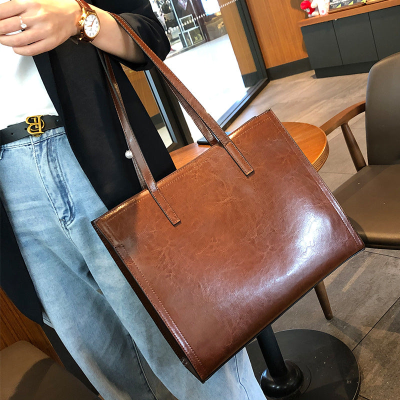 Women's Cowhide Big High-grade Retro Easy Matching Handbags