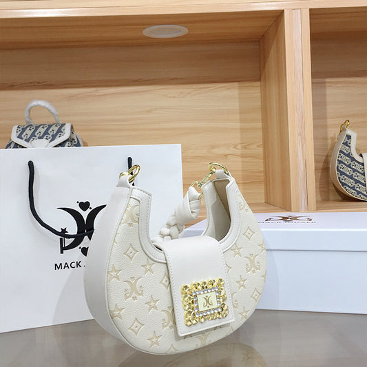 Women's French Minority Embossed Crescent Hand-woven Twist Armpit Bags