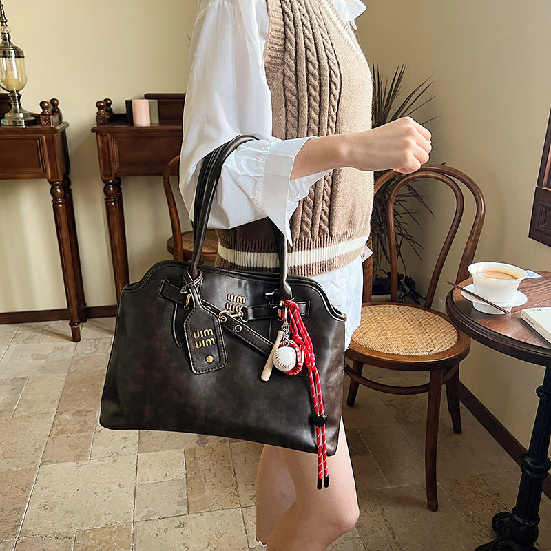 Women's Retro Hand-held Advanced Exquisite Commuter Bags
