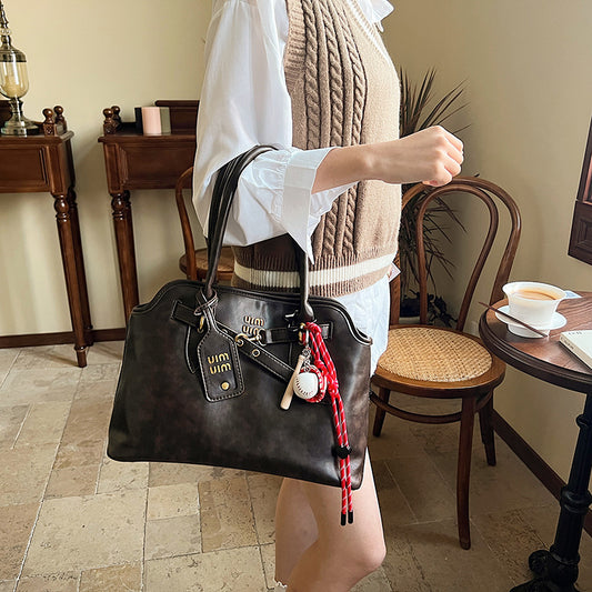 Women's Retro Hand-held Advanced Exquisite Commuter Bags