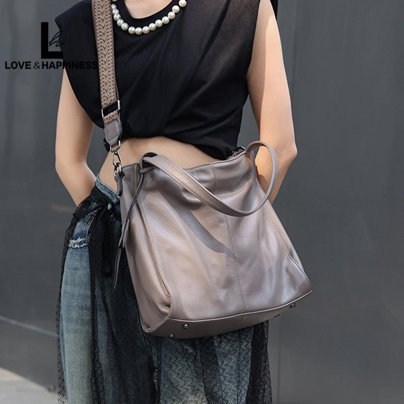 Women's First Layer Cowhide Simple Solid Color Commute Tote Bags