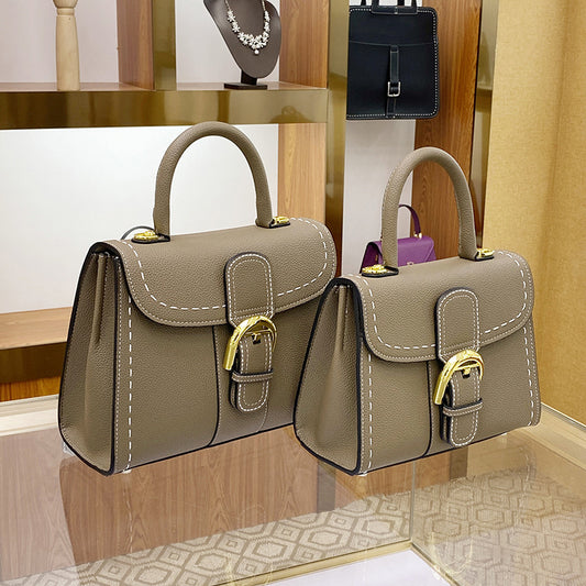 Women's Vachette Clasp Cowhide Leather Kelly Saddle Handbags